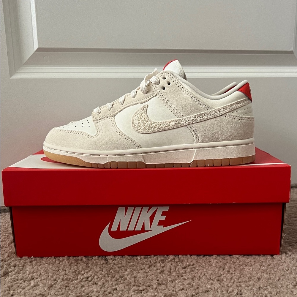 Brand new. Friendship Knot Ivory/Red-Orange Woman’s Nike Dunk Low Sz 8